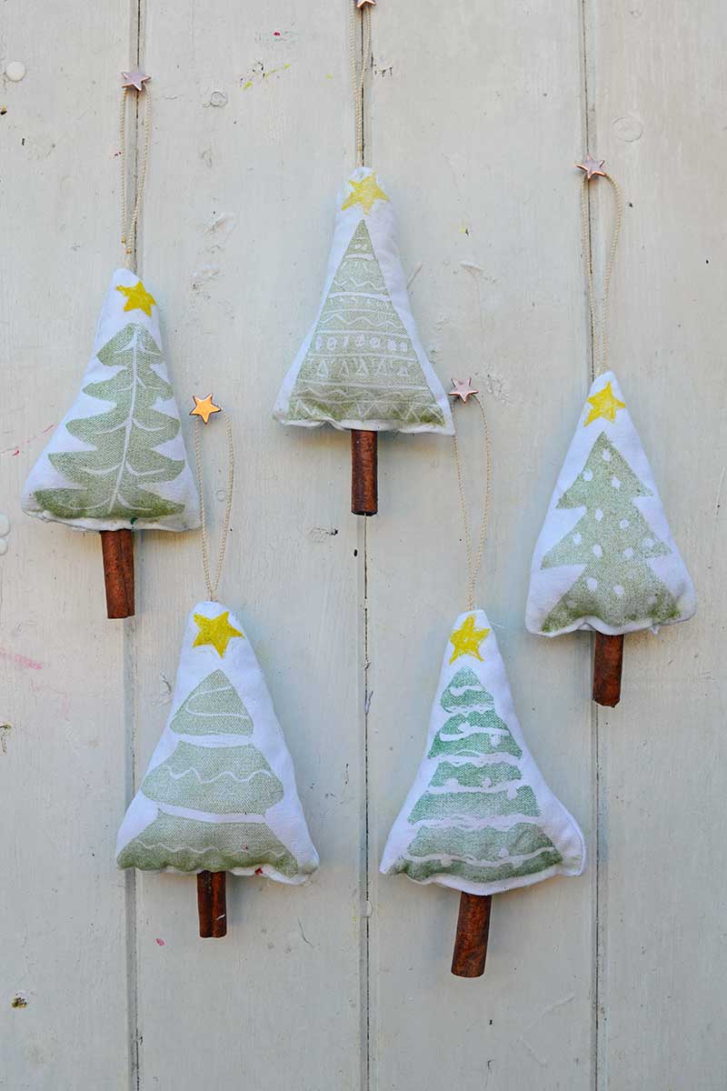 forest of stamped cinnamon scented Christmas ornaments