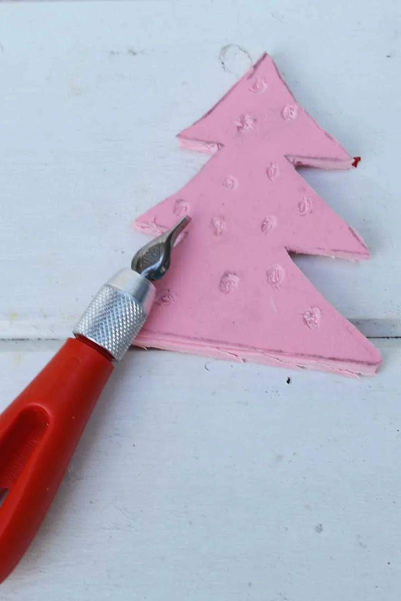 carving tree stamp out of lino