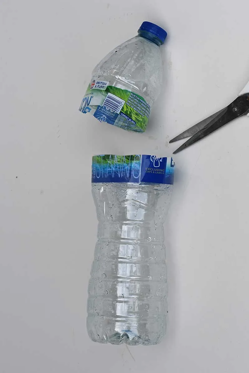 cutting water bottle to use as homemade vase