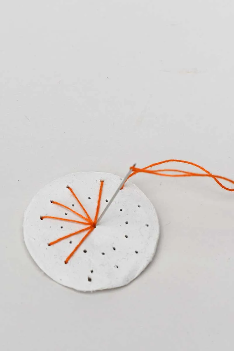 embroidering sunburst on air dry clay