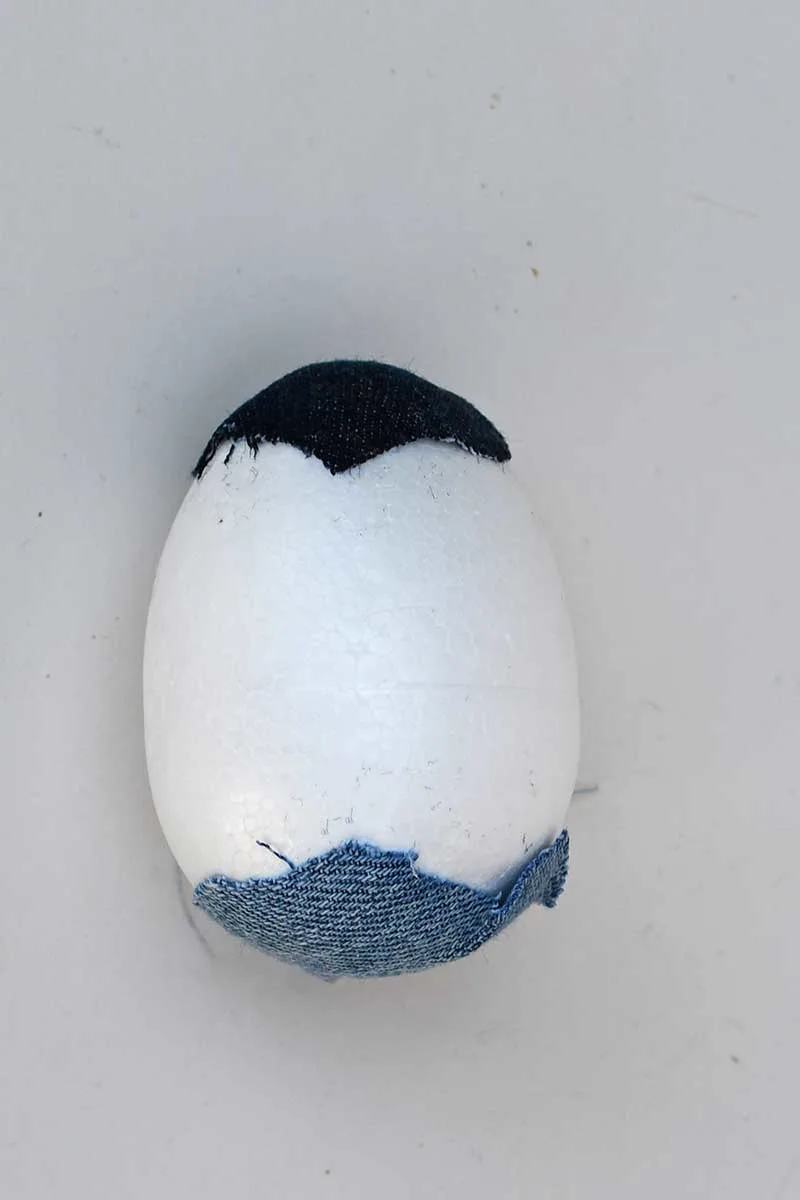 gluing fabric to top and base of polystyrene egg