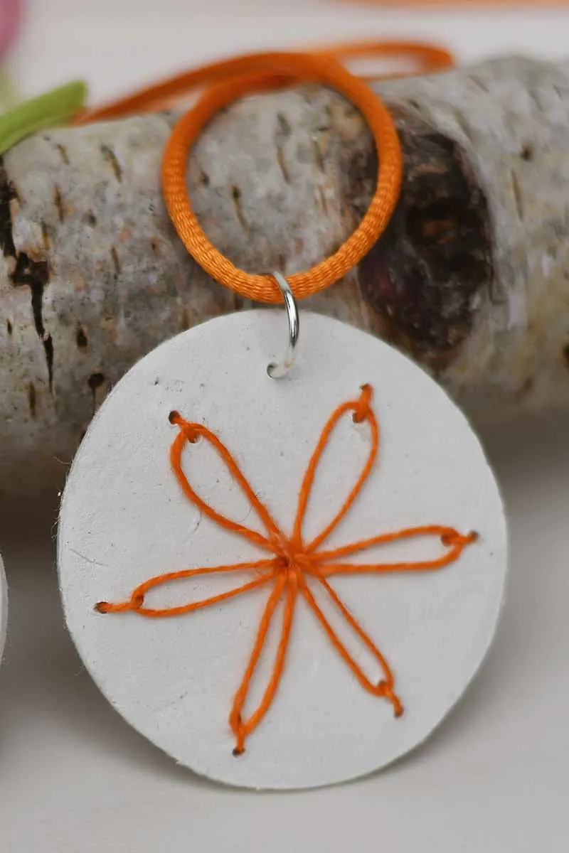 Lazy daisy embroidery clay necklace