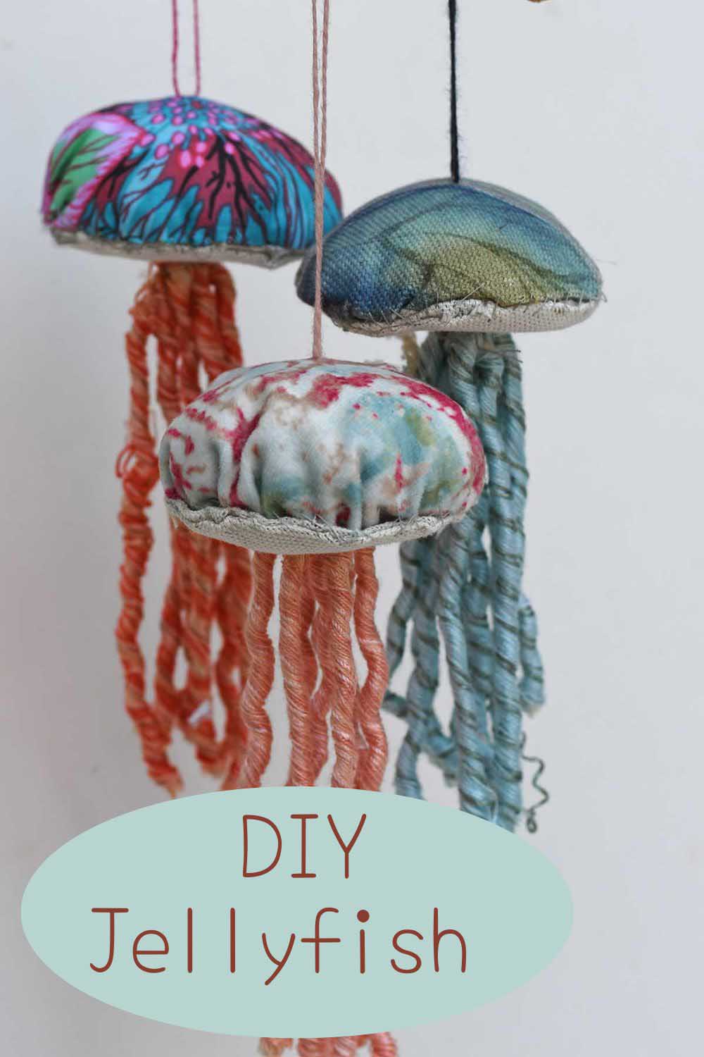 DIY scrap fabric jellyfish pin with text overlay