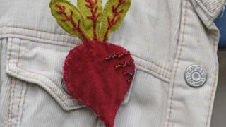 diy beetroot brooch on cream jacket pin