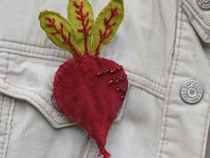 diy beetroot brooch on cream jacket pin