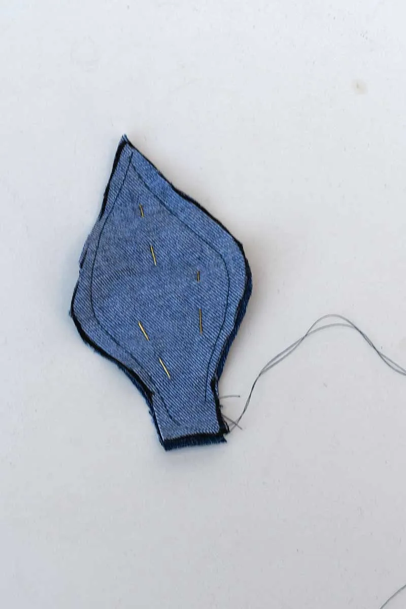 sewing a denim leaf