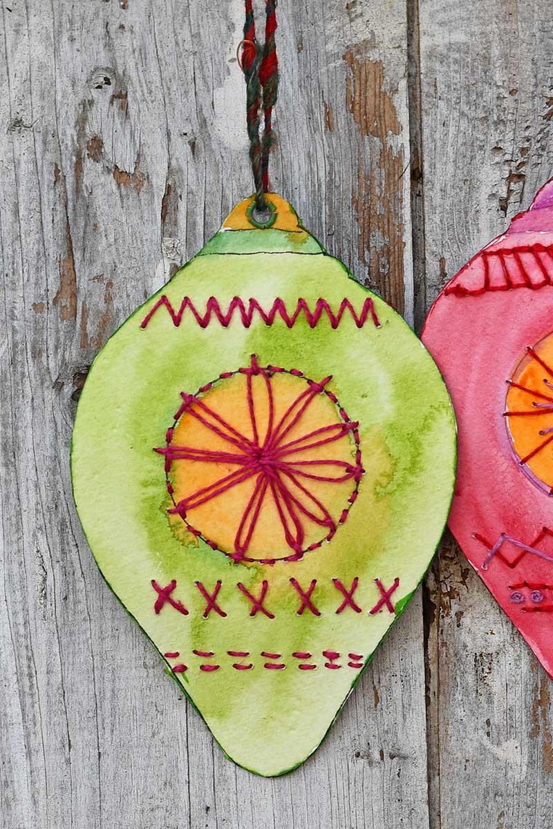 Green paper embroidery hanging bauble