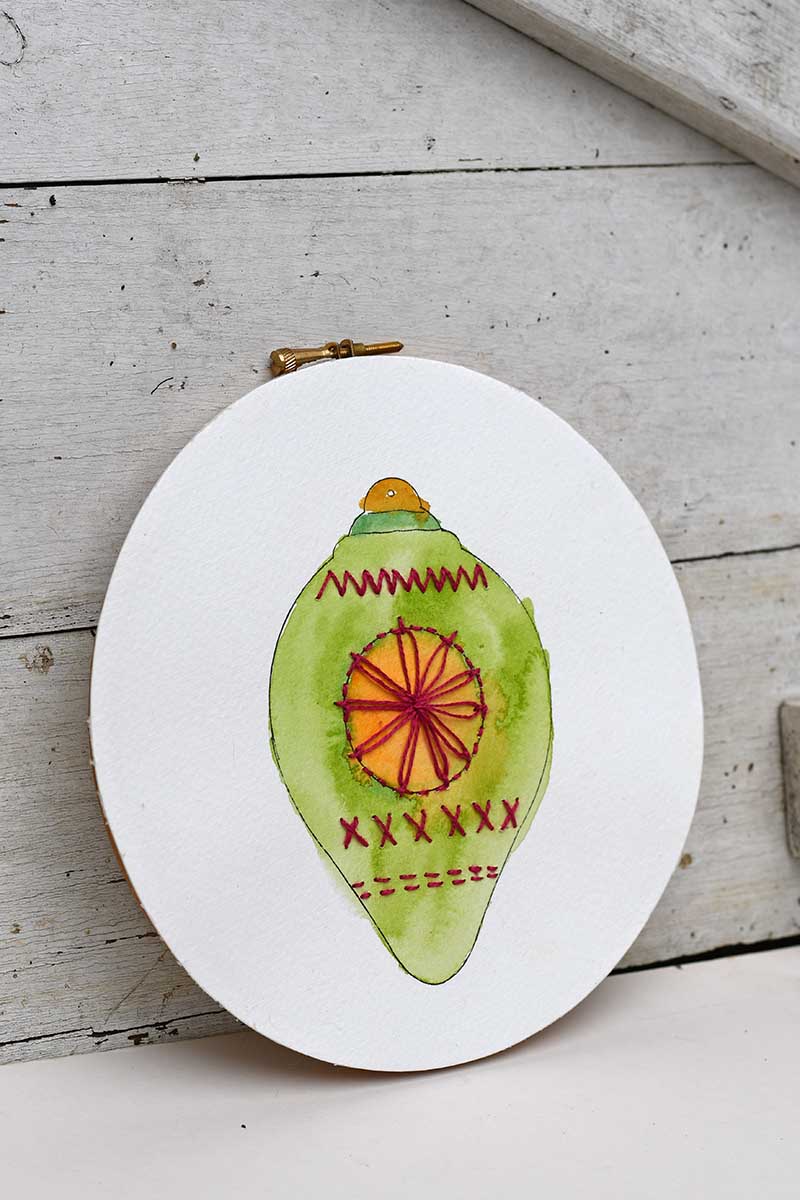 finished embroidered paper bauble design