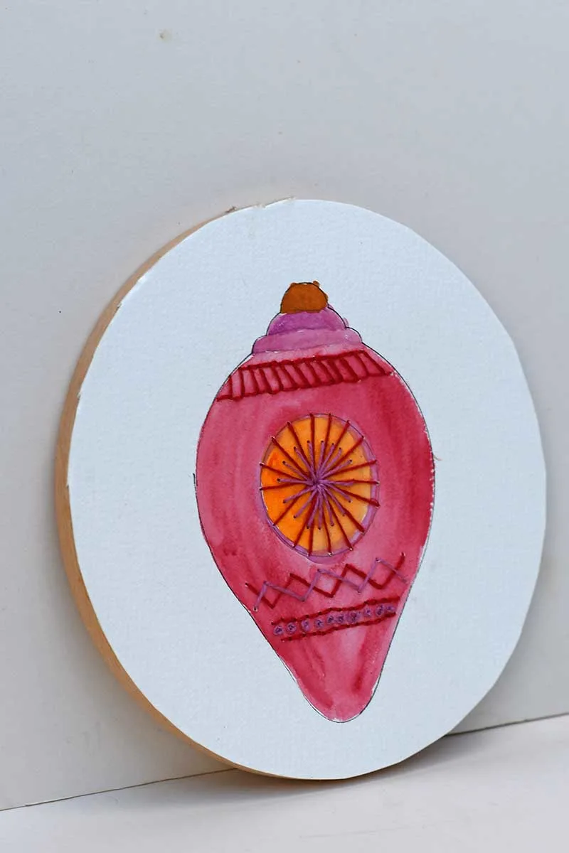 red paper embroidery in hoop