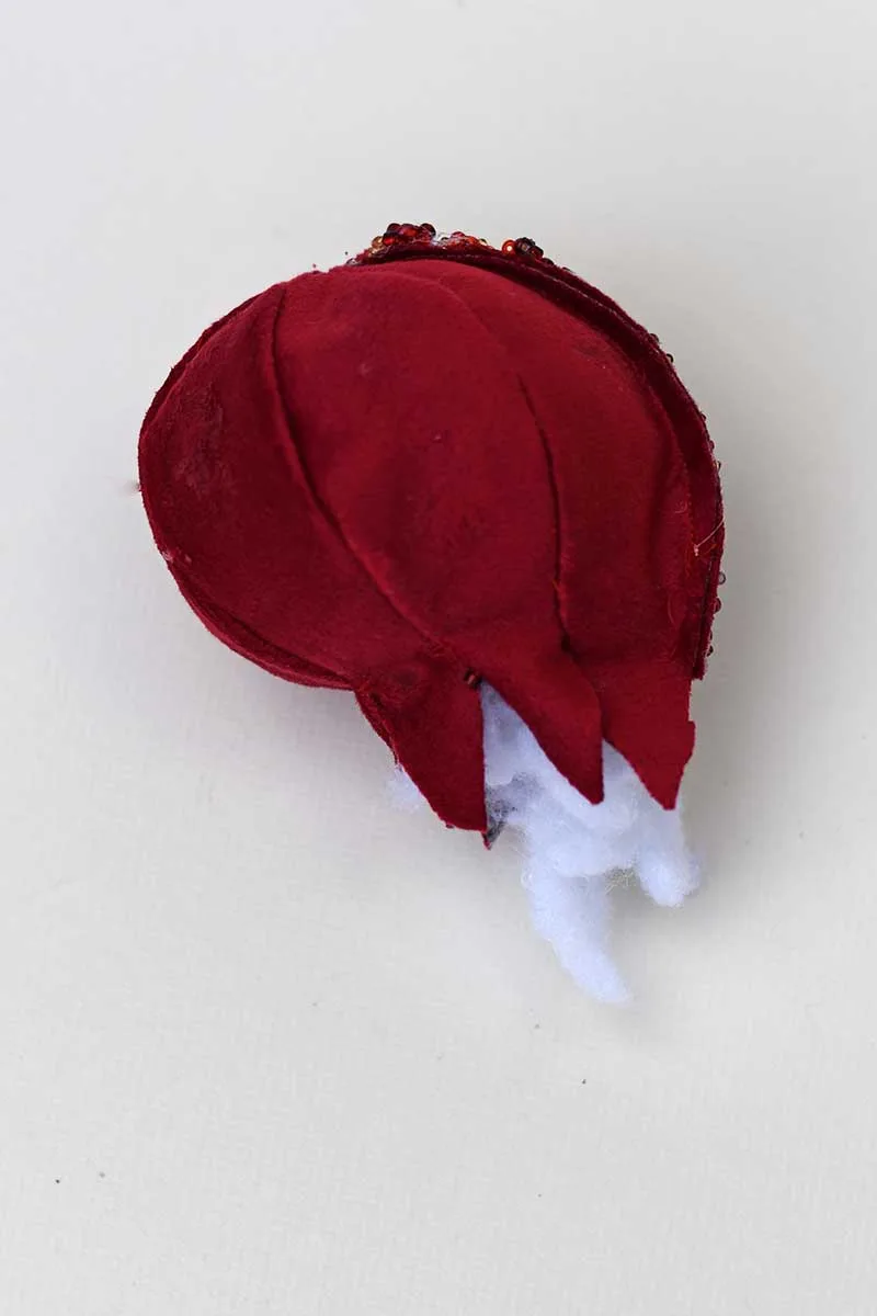 stuffing the velvet pomegranate ornament