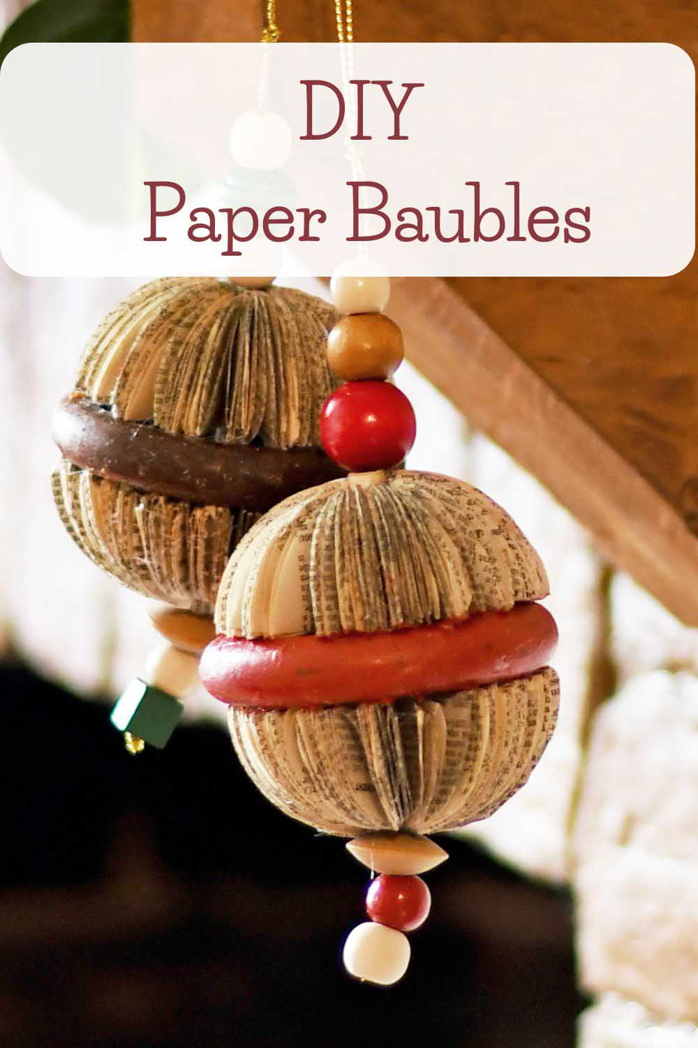 2 hanging diy paper Christmas ornaments from old book pages