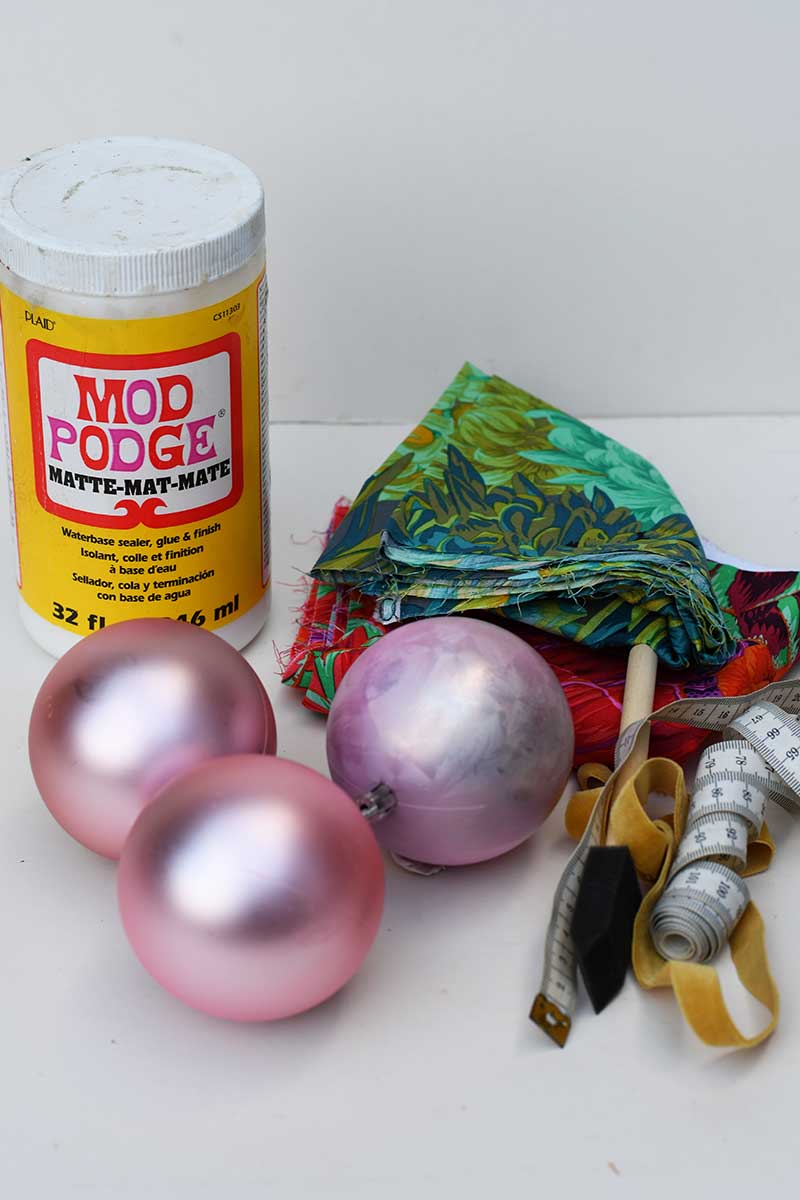 mod podge, fabric 3 pink baubles tape measure