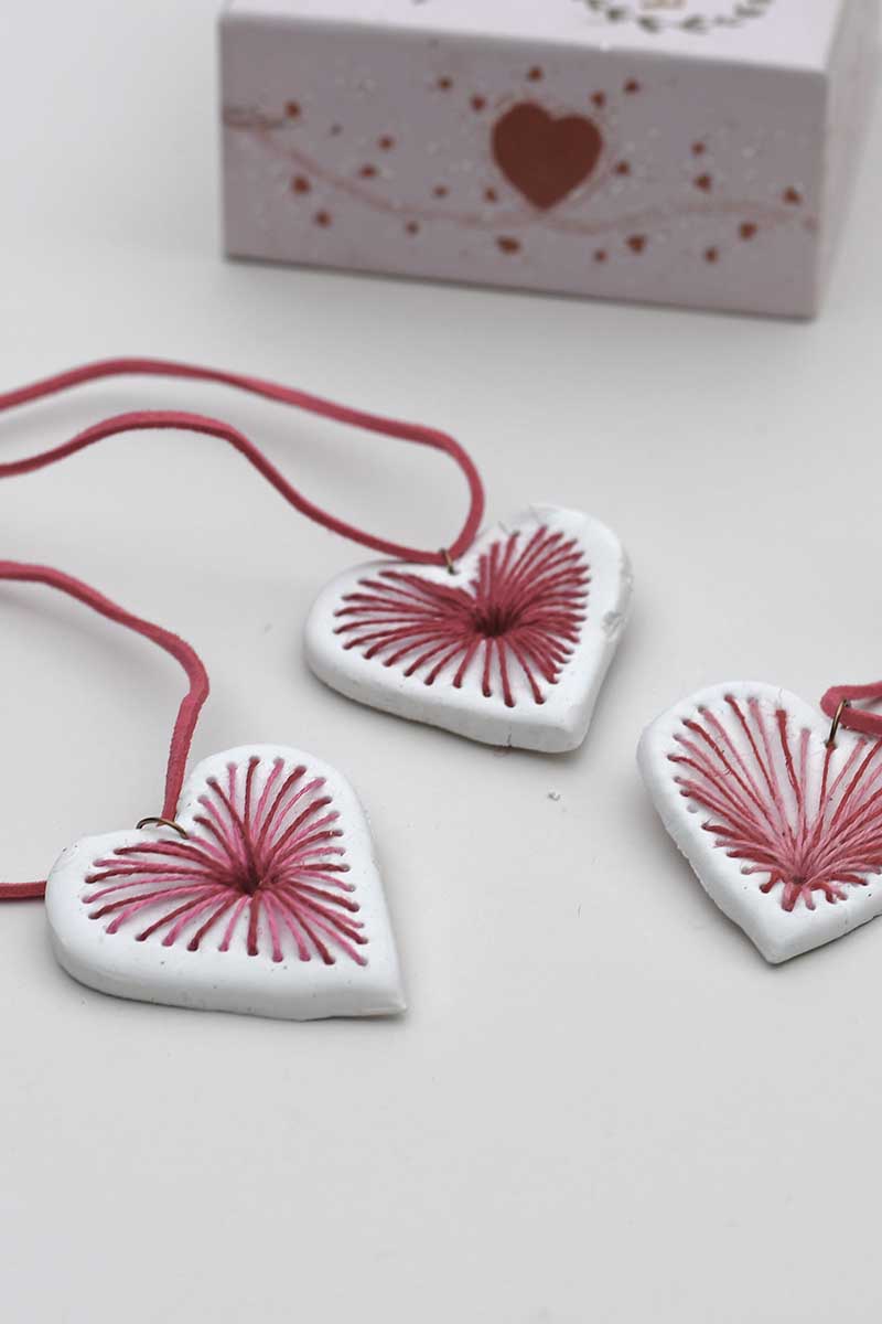 three air dry clay embroidered pendant necklaces