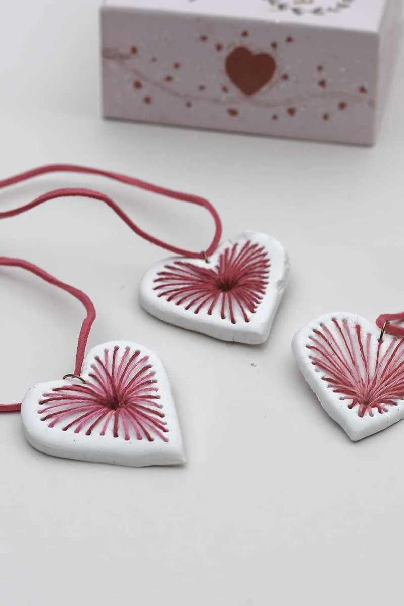 three air dry clay embroidered pendant necklaces