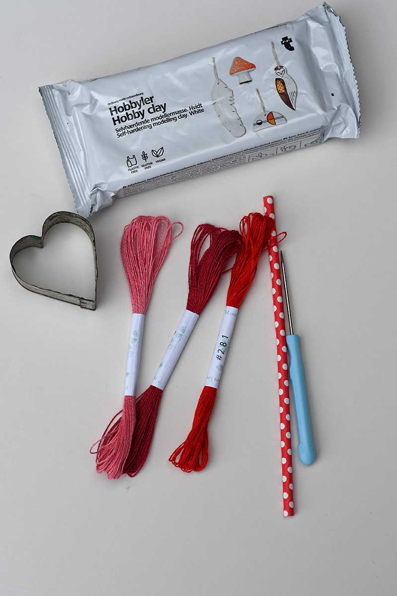 air dry clay heart cookie cutter, embroidery threads and needle